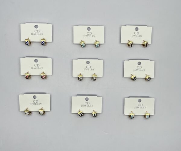 AC5101-18 - Candonga huggies en acero tono dorado con murano
